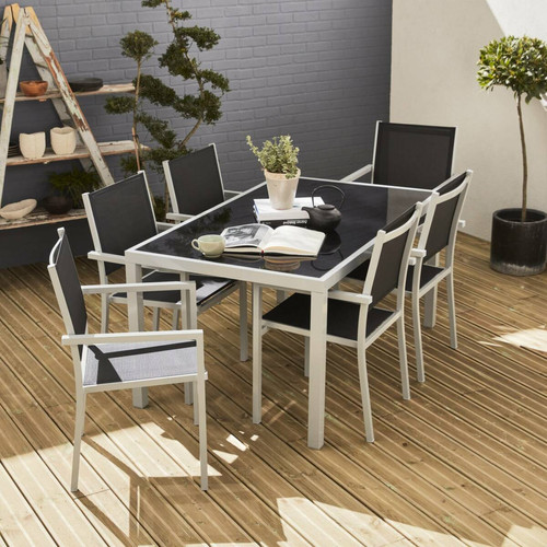 Ensembles canapés et fauteuils sweeek Salon de jardin Capua en aluminium table 150cm, 6 fauteuils en textylène noir et alu gris | sweeek