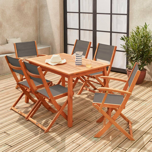 sweeek Salon de jardin en bois Almeria, table 120-180cm rectangulaire, 2 fauteuils et 4 chaises eucalyptus  et textilène anthracite | sweeek