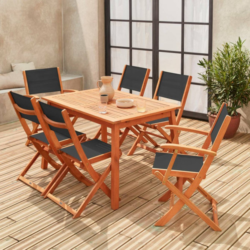 sweeek Salon de jardin en bois Almeria, table 120-180cm rectangulaire, 2 fauteuils et 4 chaises eucalyptus  et textilène noir | sweeek