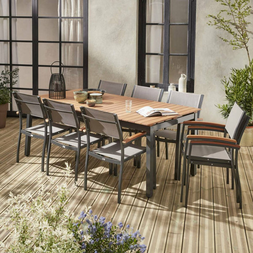 sweeek Salon de jardin en bois et aluminium Sevilla, grande table 200-250cm rectangulaire avec allonge papillon, textilène gris taupe | sweeek