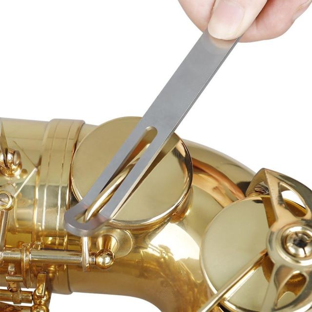 marque generique Kit d'entretien de réparation de Saxophone inclus crochet à ressort à aiguille de saxo, outil de couverture de clé, outil de trou de son et ensemble