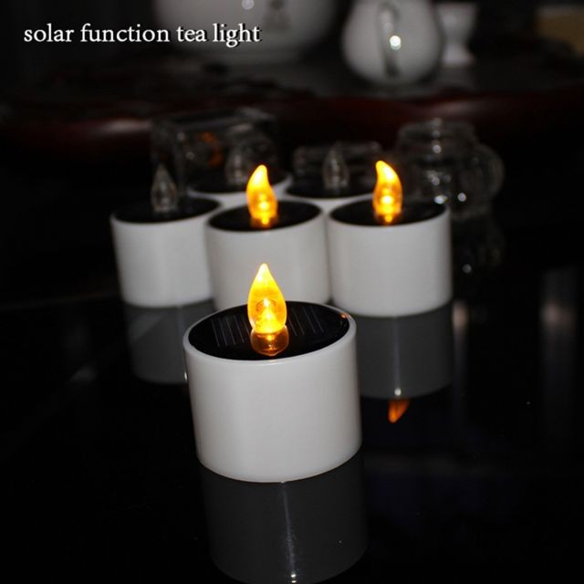 marque generique 4x bougies électriques actionnées solaires de LED flamboyant jaune-clair de thé